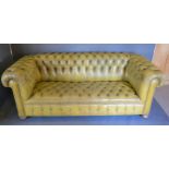 A button upholstered leather Chesterfield sofa in green, 206cms long, 87cms deep and 74cms tall