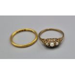 A 22ct Gold Wedding Band, 1.9g, together with a 9ct gold pearl set dress ring 1.1g