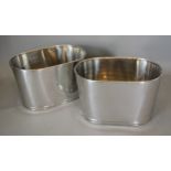 A pair of oval Champagne coolers, each inscribed Bollinger, 43cms X 28cms