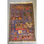 A Northwest Persian rug, with an all over design upon a blue, red and cream ground within mutiple