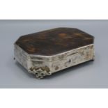 A George V silver and tortoiseshell jewellery box of rectangular form with scroll feet,,
