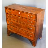 A 19th Century Mahogany Marquetry Inlaid Chest of four drawers with brass handles raised upon