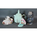 A Sadler Teapot together with a stoneware stein in the form of a monk, a German porcelain inkwell