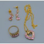 A 9ct Gold Suite of Jewellery Comprising five stone ring, a pendent with chain and a pair of drop