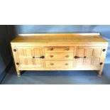 Robert (Mouseman) Thompson, An Oak Sideboard with a low galleried back and adze carved top above