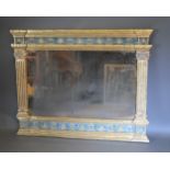 A gilded and painted wall mirror with a rectangular plate flanked by reeded columns, 100cms X 125cms