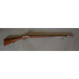 A 19th Century percussion rifle, serial number 1106, 131cms long