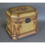 A painted wooden chest, with a hinged top and scroll feet, 50cms wide, 40cms deep and 44cms high