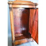 A 19th Century Beidermeier Cabinet, the moulded top above a fabric pleated and bow glazed door