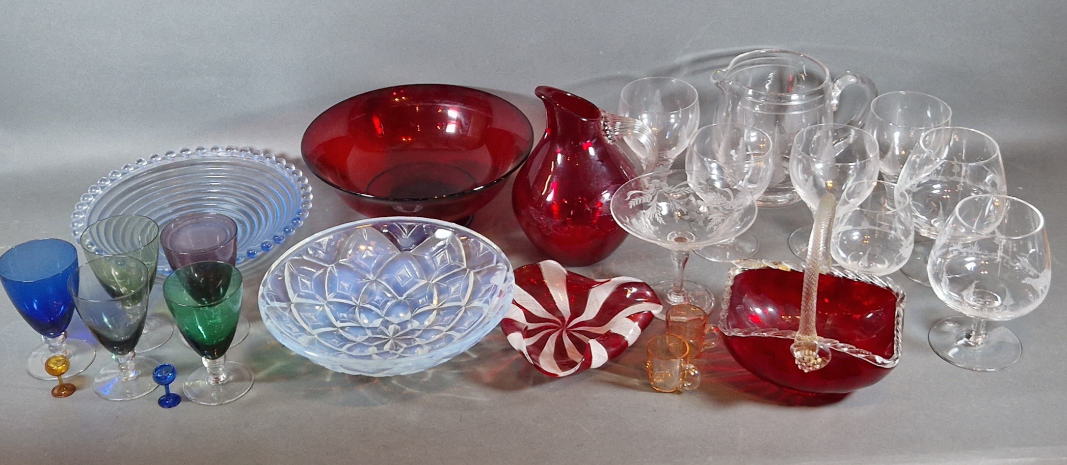 A collection of glassware to include a Stuart glass drinking set