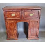 A 19th Century mahogany secretaire side cabinet with a fitted drawer above two cupboard doors,