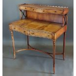 A 20th Century Serpentine writing table, the superstructure with three drawers above a leather inset