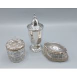 A silver sugar sifter, (marks rubbed) together with two silver topped dressing table bottles