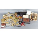 A collection of compacts and pill boxes and other items