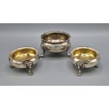 A Pair of Edwardian Silver Salts with lion head and paw supports, London 1908 makers C S Harris &