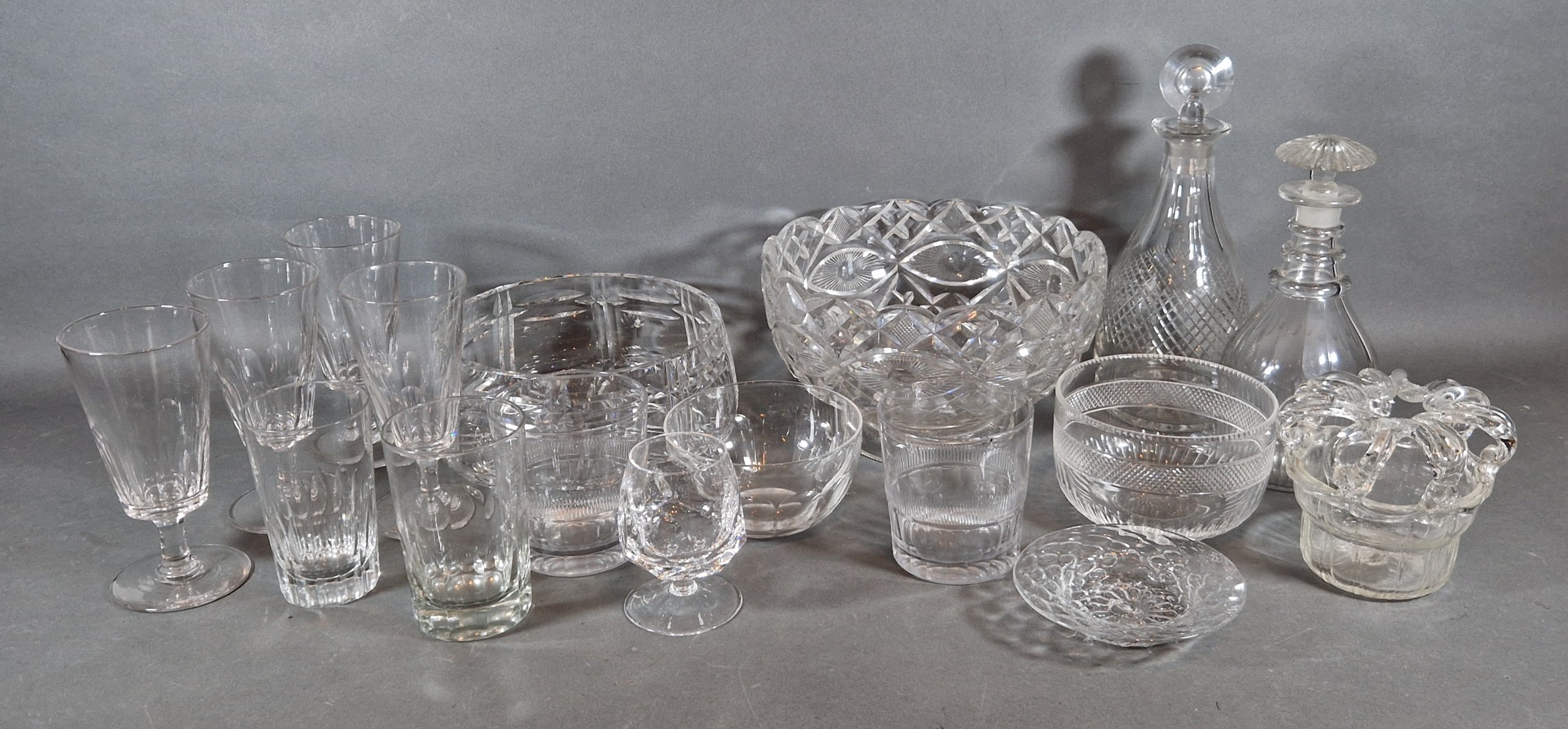 Two cut glass decanters with stoppers together with a collection of glassware