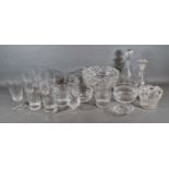 Two cut glass decanters with stoppers together with a collection of glassware