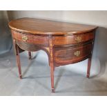 A 19th Century marquetry inlaid demi-lune side table with a central drawer flanked by cupboards