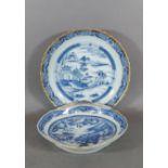 An Ealy 19th Century Chinese porcelain dish decorated under glaze blue together with a similar