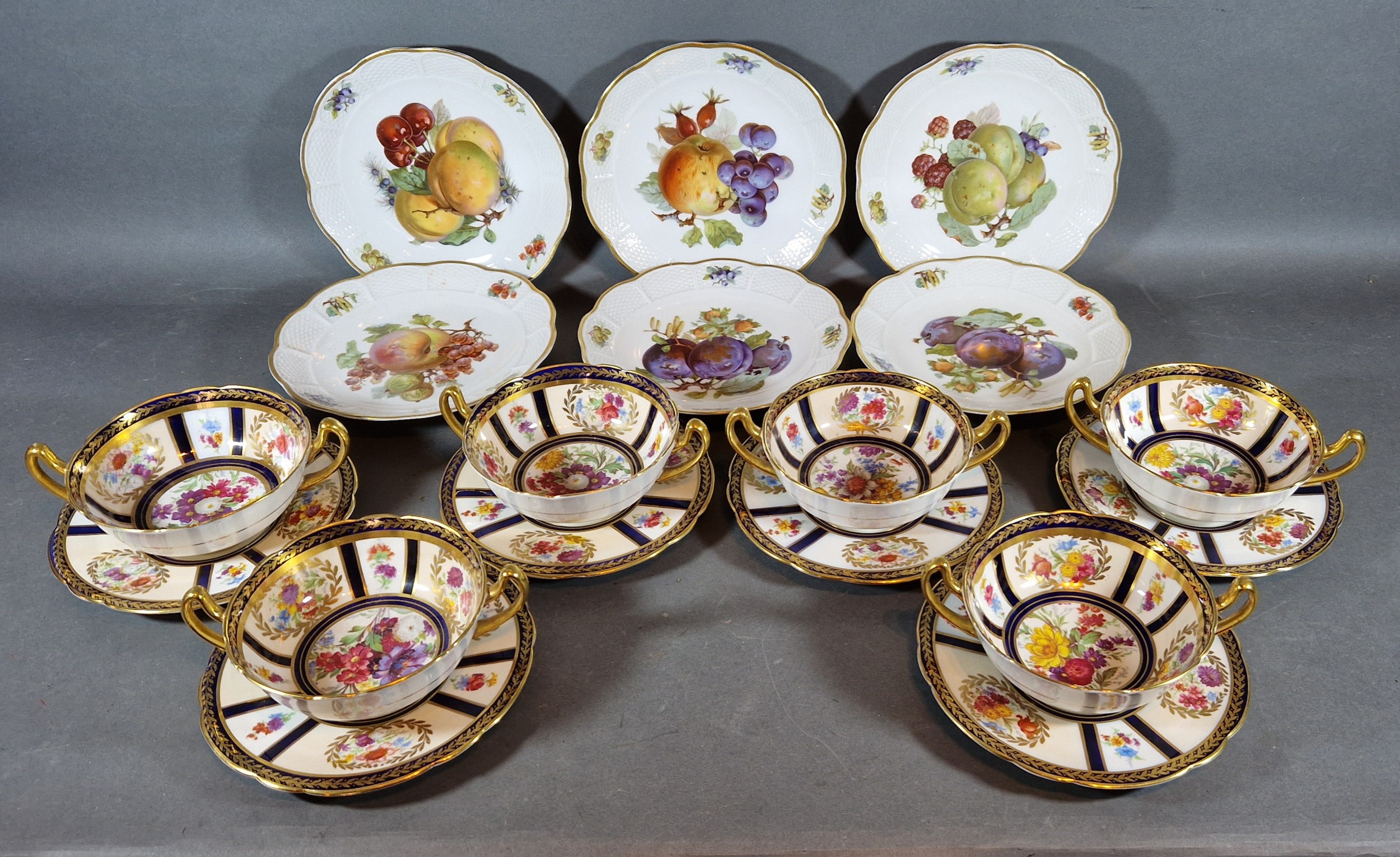 A set of six Paragon two handled bowls with saucers each hand painted with summer flowers and