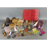 A first world war mounted grenade together with a collection of related items to include medals