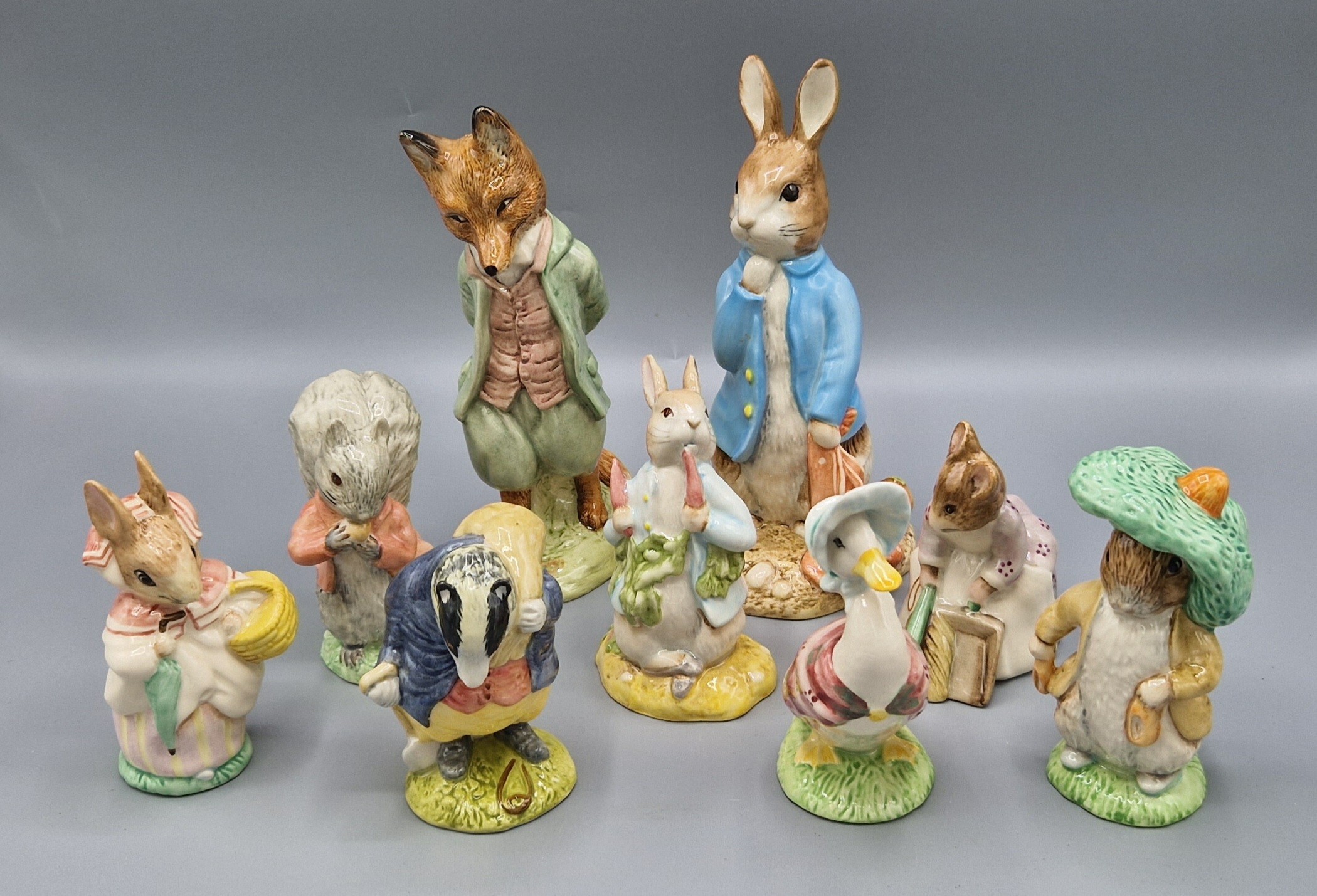 A Royal Albert Beatrix Potter figure Foxy whiskered Gentleman together with another similar Peter