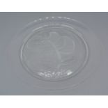 A Lalique glass annual plate, Dream Rose flower pattern, signed Lalique France, 21.5cms diameter