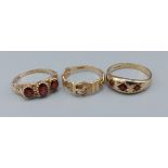A 9ct gold ring set with three Garnets together with another similar and a 9ct gold ring in the form
