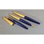 A Waterman Edson Sapphire Blue fountain pen together with two matching ball point pens