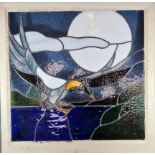 A Stained Glass Window depicting a duck in flight, within a painted frame 76cm by 77cm