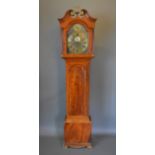 A George III mahogany longcase clock, the arched door with swan neck pediment above an arched door