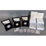 A set of four silver proof two pound coins together with seven silver proof coins