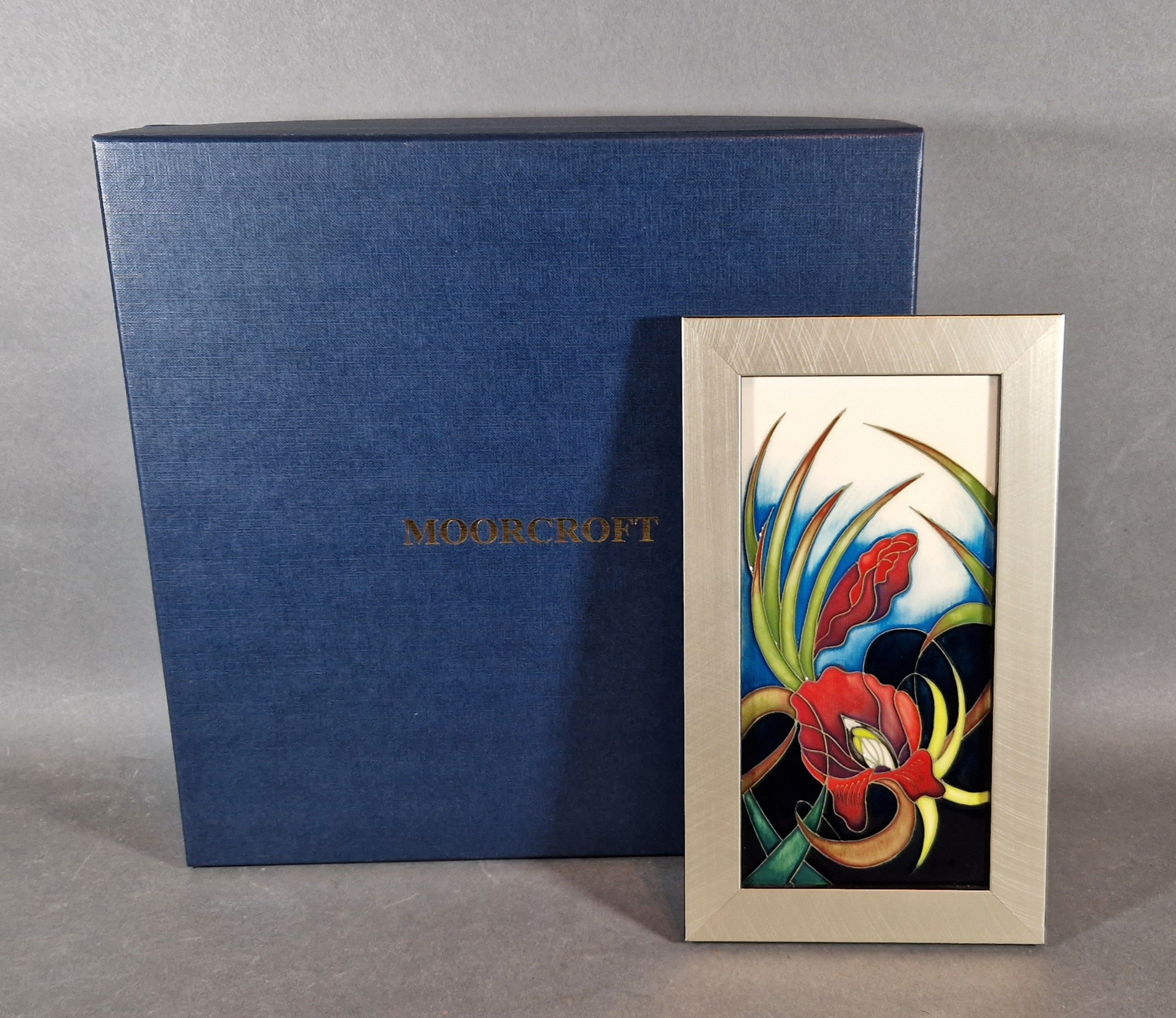A Morrcroft tube lined rectangular plaque, Satin Flower pattern, 20.5cms x 10cms with original box