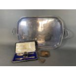 A London silver three piece Christening set in case, A Birmingham silver cigarette case, a