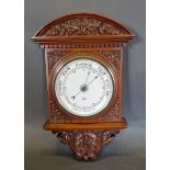 A Victorian walnut barometer by Cary London with carved case, 55cms tall
