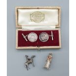 A Pair of 925 Silver Masonic Cufflink, together with a charm in the form of a light house and