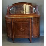 An Edwardian mahogany and marquetry inlaid Credenza cabinet. The inlaid mirrored back above an