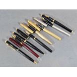 A Sheaffer fountain pen together with another similar, A fountain pen by Cross and a collection of