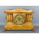 A Victorian simulated marble mantel clock, the dial with Roman numerals and two train movement