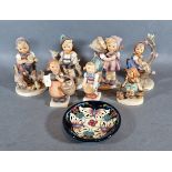 A collection of seven Goebels Hummel figures together with a Moorcroft small bowl