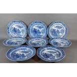 A set of seven 19th Century Chinese dishes decorated under glaze blue together with another