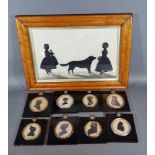 A set of eight silhouette portrait miniatures within ebonised frames together with a larger