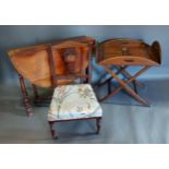 A Mahogany Butlers Tray on Stand, together with an oval Sutherland table, a bow fronted sideboard,