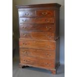 A 19th Century mahogany chest on chest, the moulded cornice above two short and six long drawers