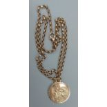 A 9ct gold St Christopher pendant with 9ct gold linked chain, 9.4 grams