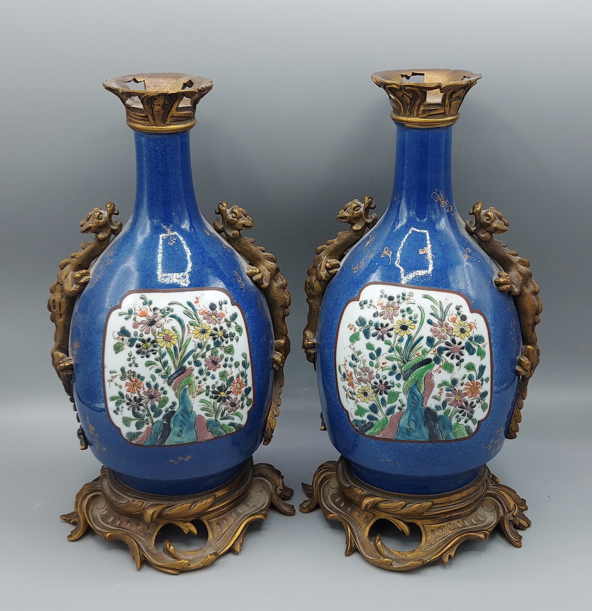 A pair of 19th Century Samson Famille Verte vases with gilt bronze mounts, each decorated with a