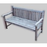 A teak garden bench with slatted back and set, 150cms long