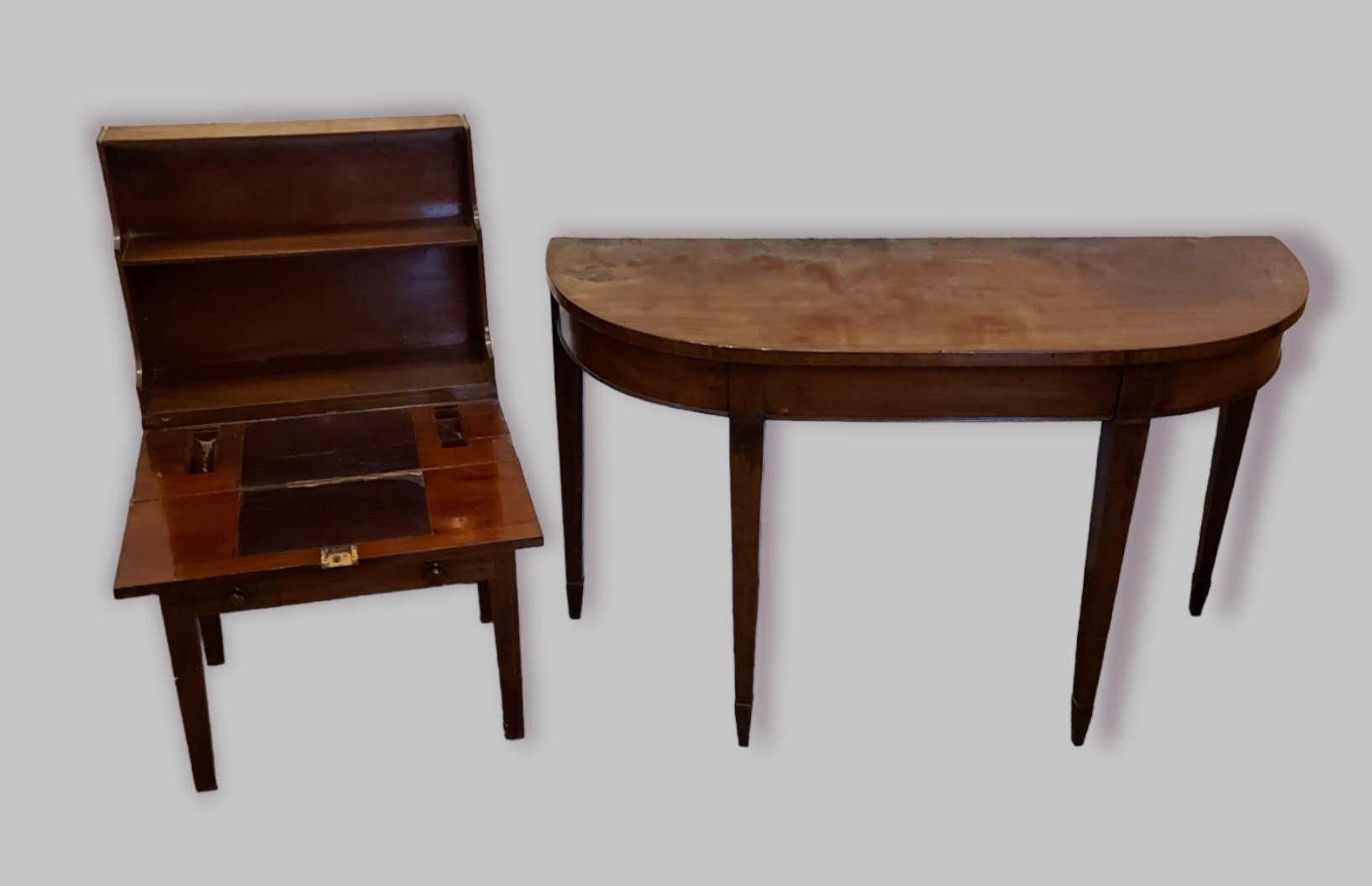 A 19th century mahogany side table together with a mahogany childs writing desk