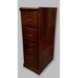 A mahogany four drawer filing cabinet with panelled sides, 45cms wide by 70cms deep by 134cms high