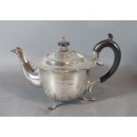 A Sheffield silver teapot with ebonised shaped handle, 10ozs